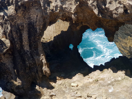Clear blue sea through a rocky frame in Mauritiusの写真素材