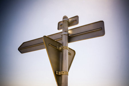 A low angle back view of french road signsの写真素材