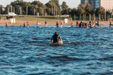 A man fell into the water from a SUP paddleboardの写真素材