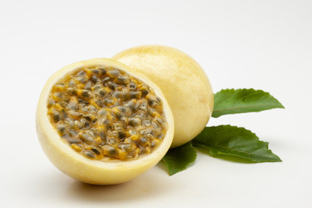 A closeup shot of fresh Maracuja (passion-fruit) isolated on a white background