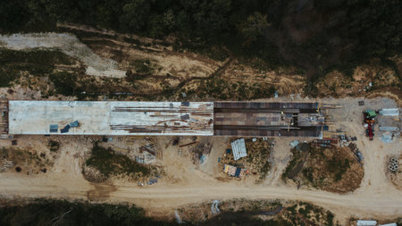 A top view of a road under construction in Brcko district surrounded by fields, Bosnia and Herzegovinaの写真素材