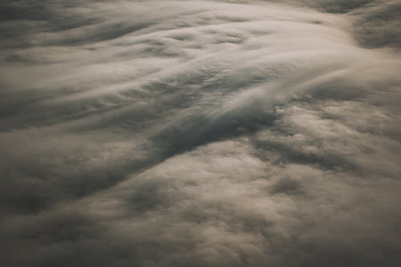A high angle shot of a cloudy sky - perfect for backgroundの写真素材