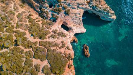 A beautiful Atlantic beaches and cliffs of Algarve, Portugal on a sunny summer dayの写真素材