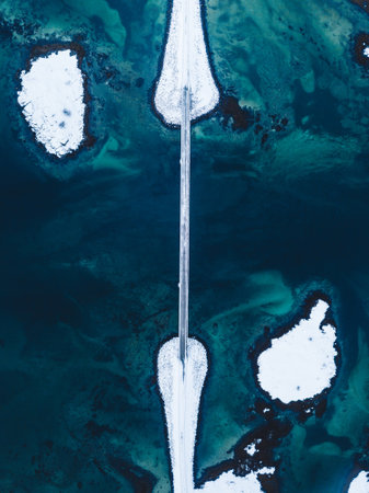 A vertical shot of icebergs in the sea in Lofoten, Northern Norwayの写真素材