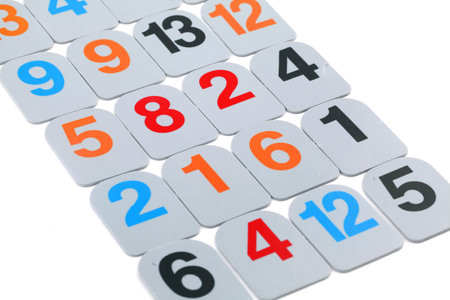 A closeup shot of colorful number pieces on a gameの写真素材