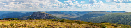 A panoramic shot of a plateau under a blue cloudy sky in southern Brazilの写真素材
