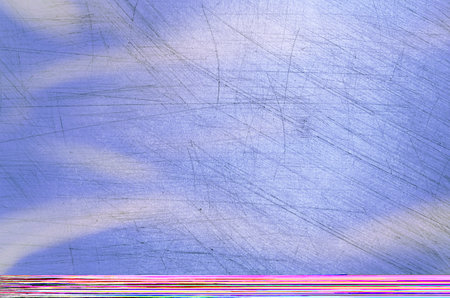 A top view of a purple textured scratched surfaceの写真素材