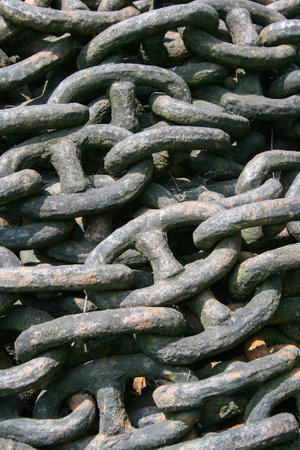 A vertical shot of old metal chainsの写真素材