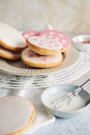 A vertical shot of delicious American pastries with glaze on a table