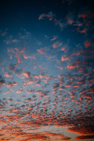 The aesthetic view of clouds on the dramatic sunset sky