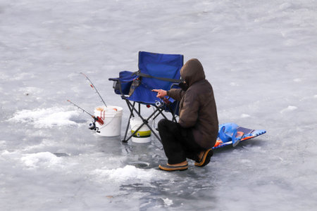 A fisher fishing on the