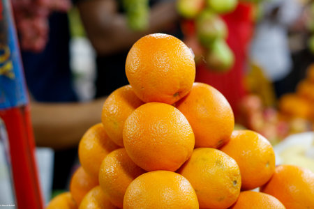 A closeup shot of a pile of juicy orangesの写真素材