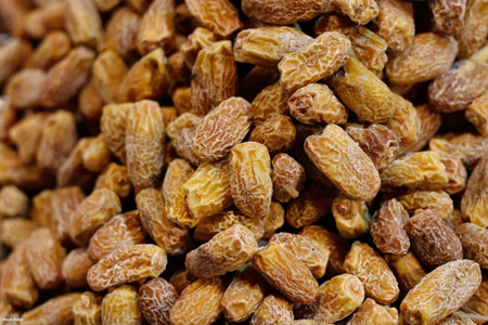 A closeup shot of a pile of dried delicious datesの写真素材