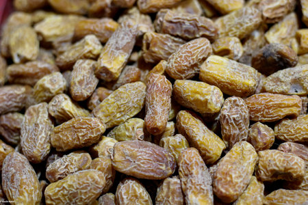 A closeup shot of a pile of dried delicious datesの写真素材