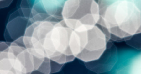 A background with blurred bokeh light on a blue background