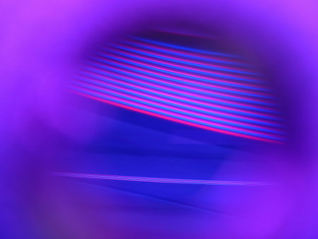 A closeup of bright purple lights in motion with long exposure - perfect for wallpapers