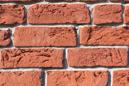 The red brick wall background