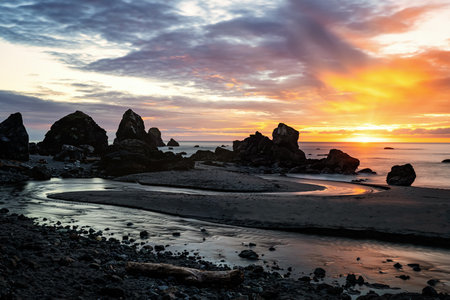 A scenic shot of a beach during sunset in Northern California, USAの写真素材