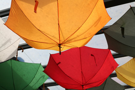 Bright colored umbrellas used as decoration in restaurant.の写真素材