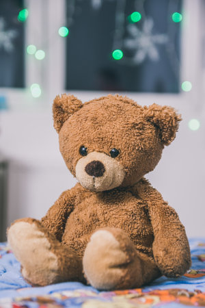 A vertical closeup shot of a cute teddy bearの写真素材