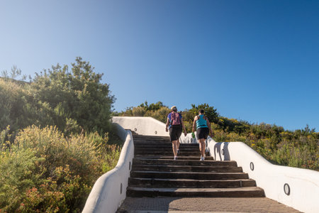 A shot of a tourists on the stairs