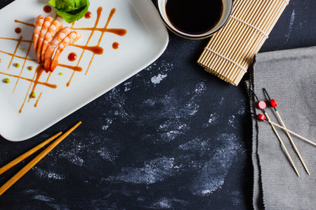 A top view of delicious Japanese shrimps with wasabi and soy sauce on the table - copy spaceの写真素材