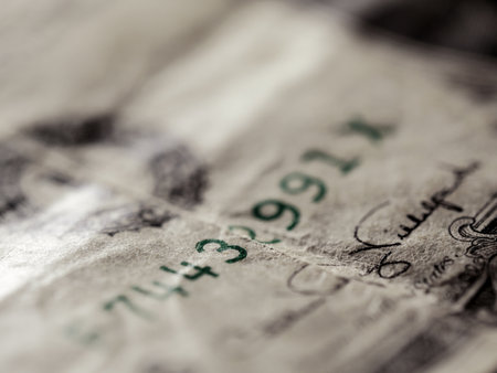 A closeup shot of the serial number of the one-dollar billの写真素材