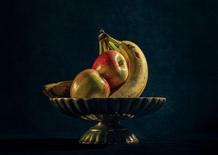 A closeup shot of fresh fruits in the metal bowlの写真素材