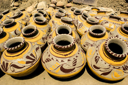 A high angle shot of beautiful handmade clay potsの写真素材