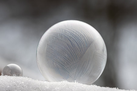 frozen soap bubbles are a mirror of winterの写真素材