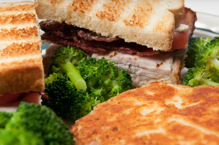 A closeup of meat sandwich and broccoliの写真素材