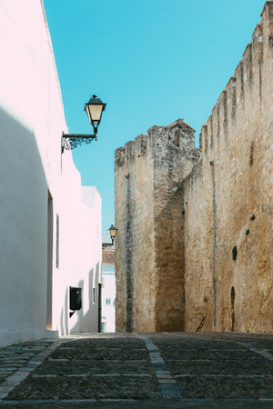 A narrow road or path in an old village Vejer de la Frontera, Grazalema, Spainの写真素材