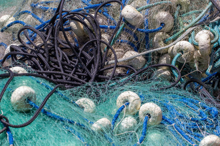 A closeup shot of the details of a fishing netの写真素材