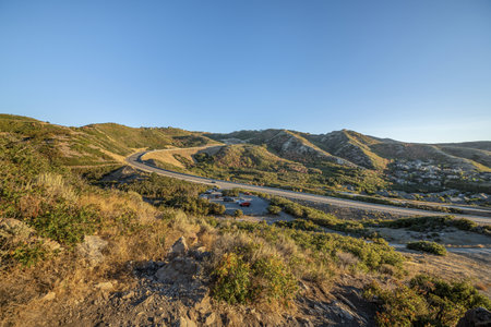 A landscape view of a road through Wasatch mountains in Utah