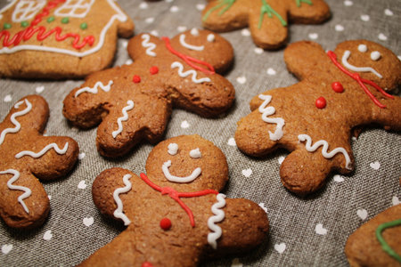 A closeup shot of gingerbread cookies with frosted drawings