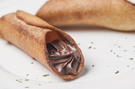 A traditional Italian dessert filled with chocolate creamの写真素材