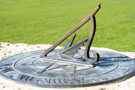 View of metal sundial at Mission Bay beach, Auckland, New Zealandの写真素材
