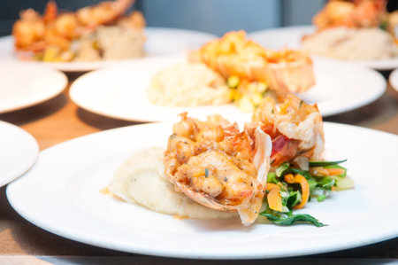 A closeup shot of a decorated dish with saladの写真素材