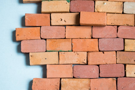 A closeup shot of many colored bricks on a blue surface