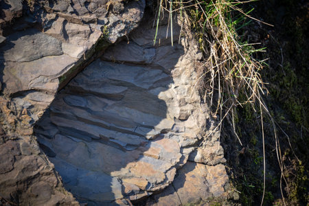A close-up of a typical rock from the Eifel. The Eifel, also known as Vulcaneifel, is well known for its volcanic rocks a popular travel destination.の写真素材