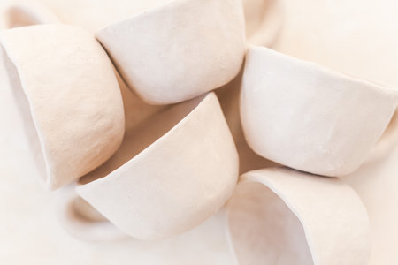 A top view of a bunch of beautiful handmade ceramic cups