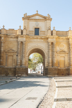 A vertical shot of the entrance of the historic center of Carmona Sevilla Andalusia, Spainの写真素材