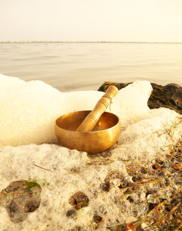 Metal singing bowl for relaxing and receiving healing vibrationsの写真素材