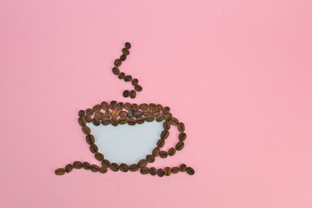 A top view of coffee beans forming a coffee cupの写真素材