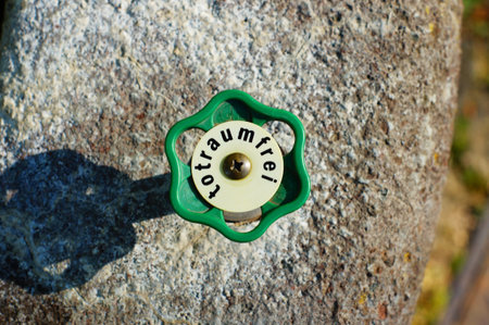 Shut-off valve on a cemetery well. 'Totraumfrei' means 'free of dead space' to prevent to prevent...