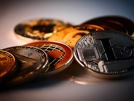 A closeup shot of gold and silver bitcoinsの写真素材