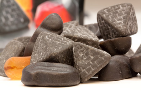 A closeup shot of tasty chocolate candies on a white backgroundの写真素材