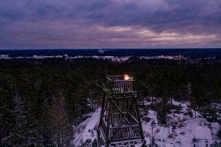 Aerial view of Santa Claus on lookout, vibrant purple dusk sky - , drone shotの写真素材