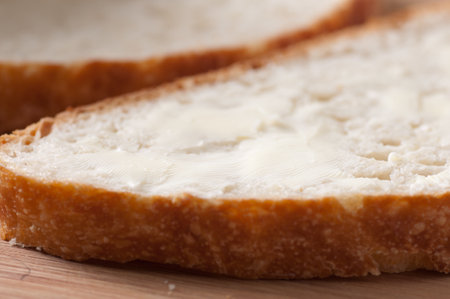 hand made fresh bread with creamy butter, artisan style stock photo