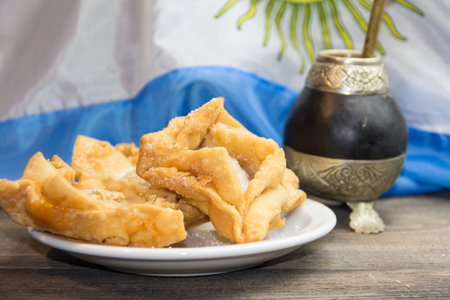 yerba mate, guitar and fried pastries, symbols of the Argentine traditionの写真素材